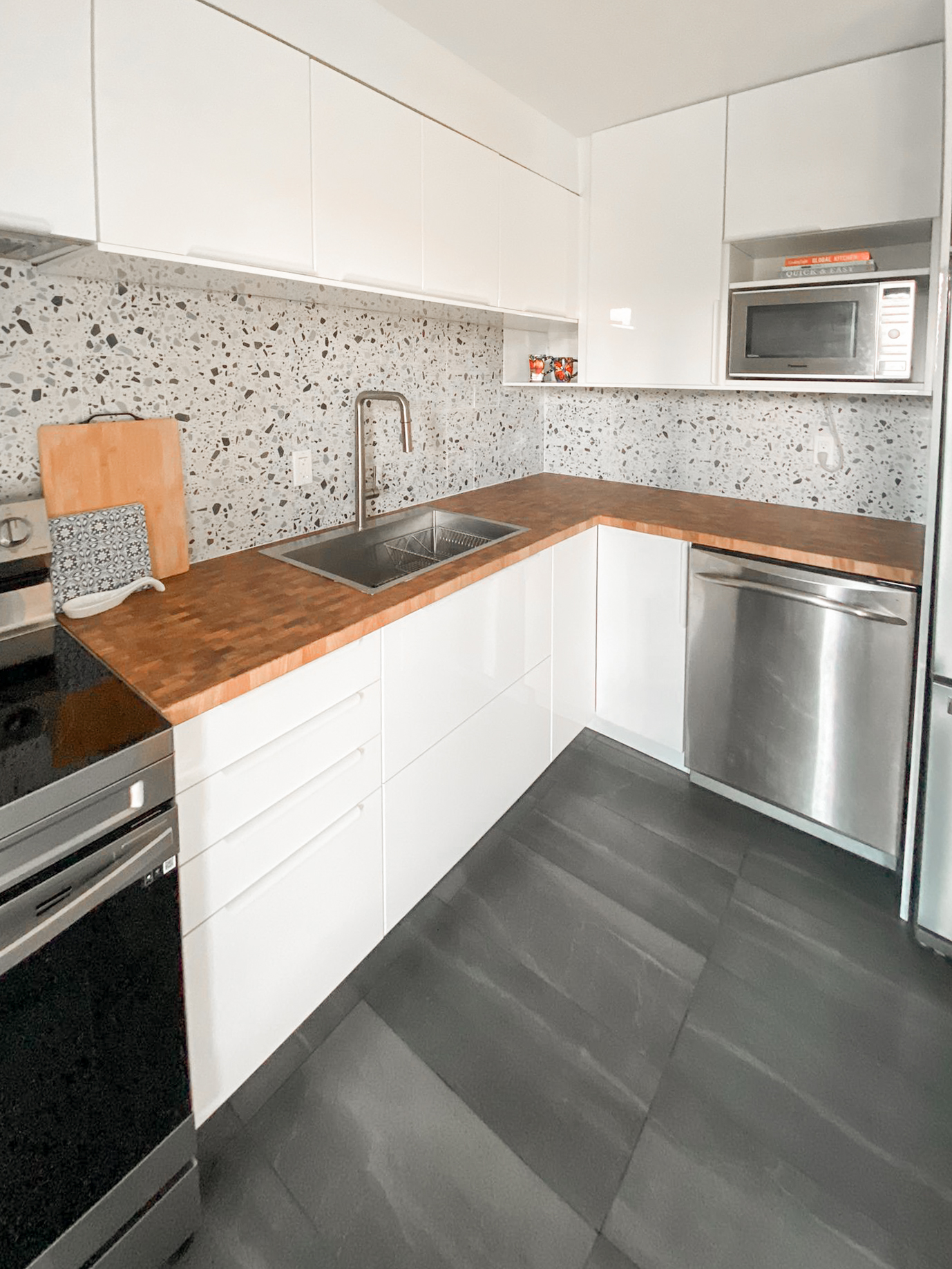 White kitchen with wooden countertops